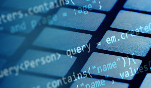 abstract code overlaying computer keyboard