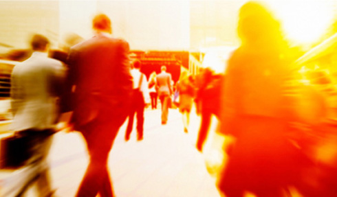 abstract businesspeople commuting to office