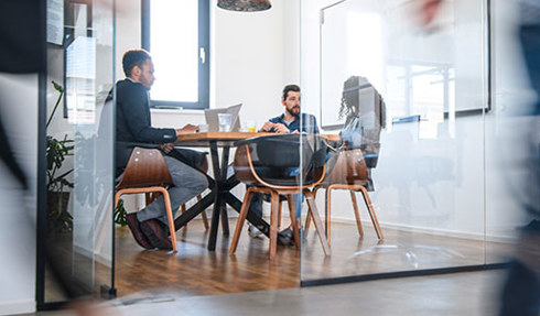 people meeting in office