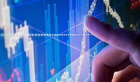 a closeup of a person's finger touching a computer screen displaying a data visualization
